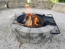 Picture of a firepit with a fire burning